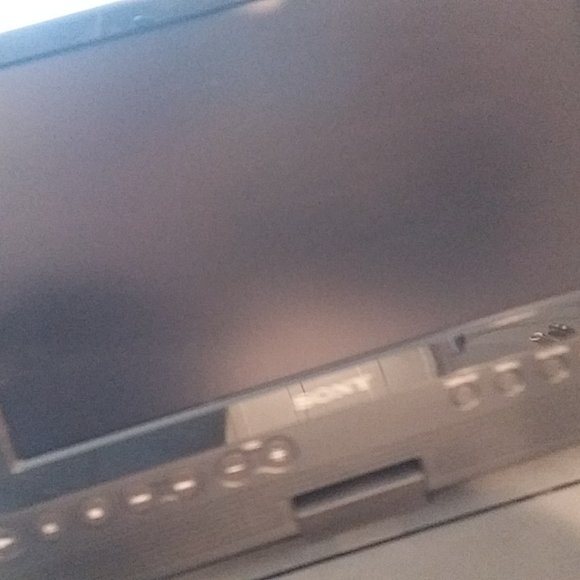 SONY DVP-FX820L Portable DVD Player and power supply. - Picture 3 of 5